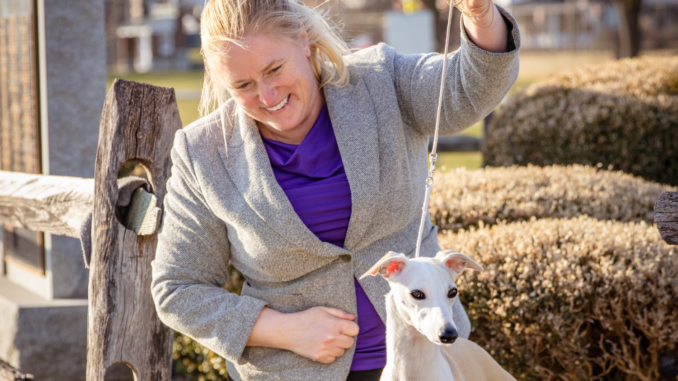 Captain Elisa Holland and her dog Daisy