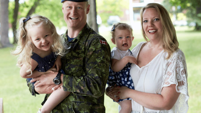 military-family-hugging-eachother